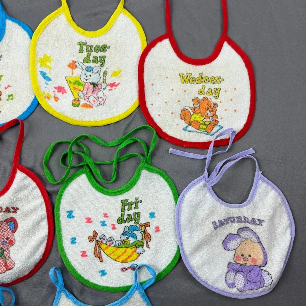 Vintage day of the week baby bibs. 10 total‎